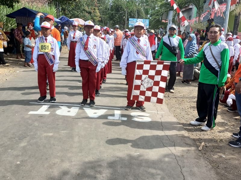 Meriah! Gerak Jalan SDN 6 Curah Tatal Warnai Peringatan Hari Kemerdekaan